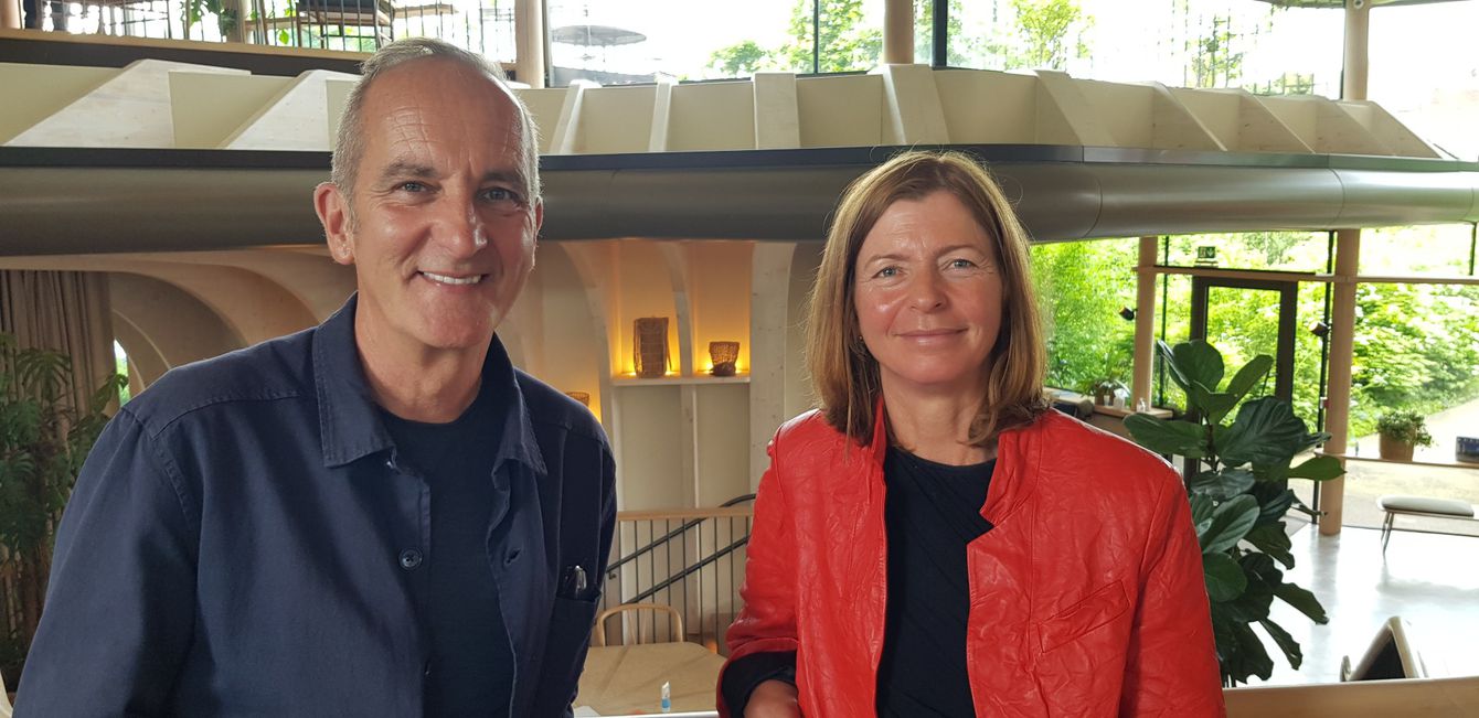 Mid-shot of Kevin McCloud and Dame Laura Lee, smiling, at Maggie's, Yorkshire